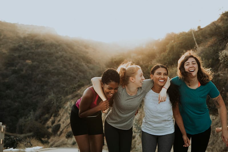 friends hiking through hills los angeles scaled